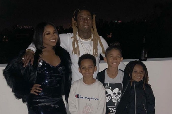 Kameron with his father and three half siblings.